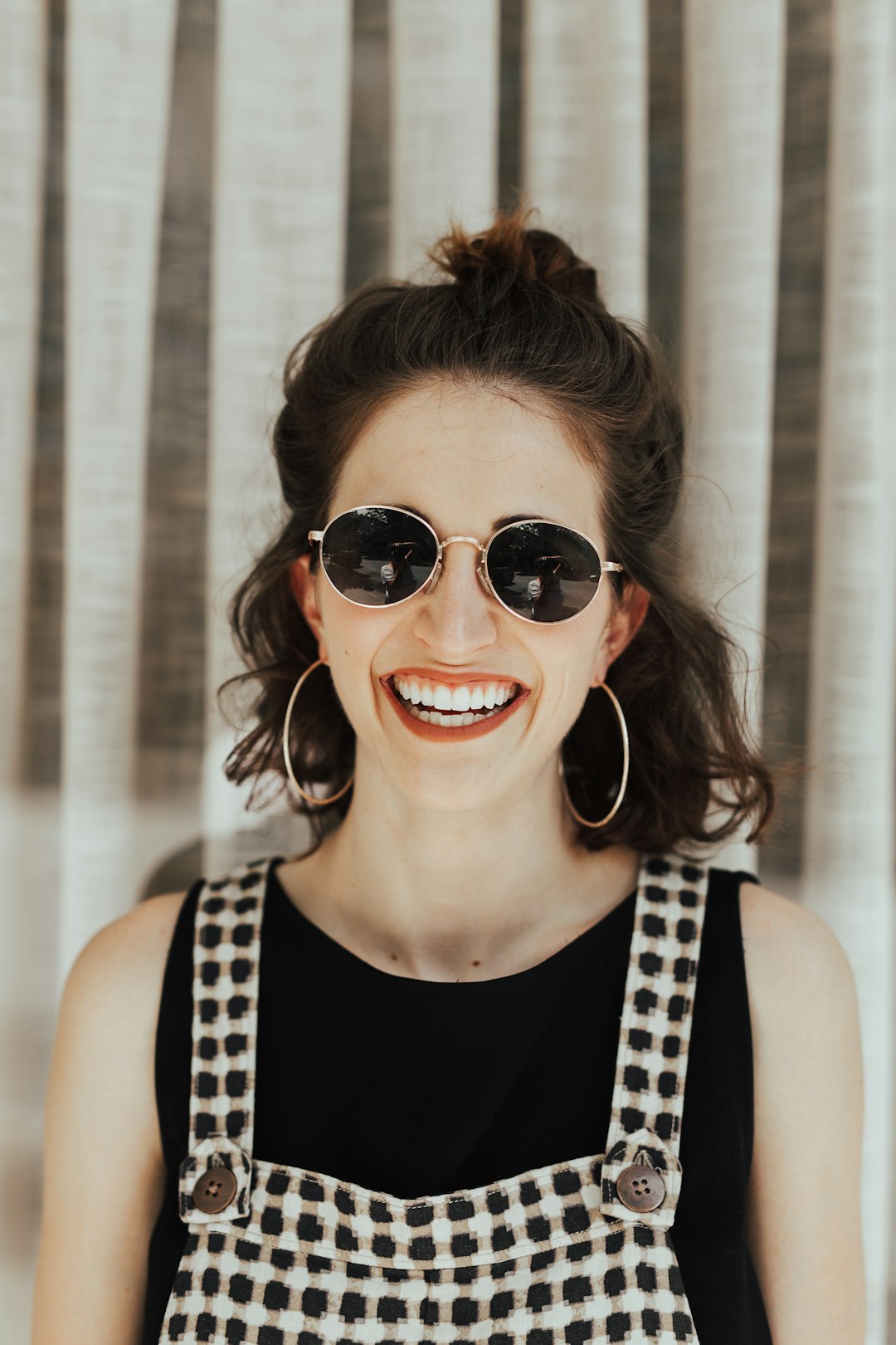 Photo by Brooke Cagle woman wearing white and black rompers and black top